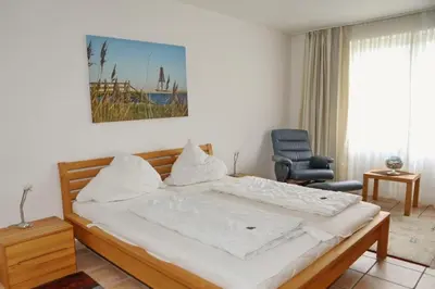 Ein Bett oder Betten in einem Zimmer der Unterkunft Haus Nordseeblick, App 04