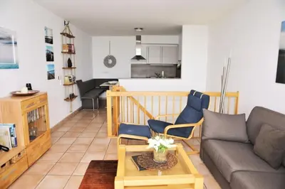 Ein Sitzbereich in der Unterkunft Haus Nordseeblick, App 04