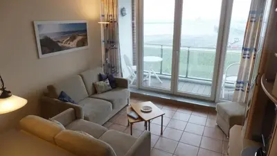 Ein Sitzbereich in der Unterkunft Haus Nordseeblick, App 22