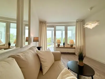 Ein Sitzbereich in der Unterkunft KurparkResidenz 211 B Ferienwohnung 2 Zimmer Wellnessbereich