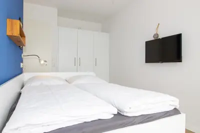 Ein Bett oder Betten in einem Zimmer der Unterkunft Marina 24-A