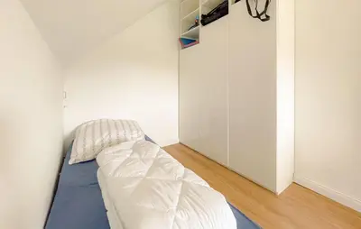Ein Bett oder Betten in einem Zimmer der Unterkunft Stunning Home In Friedrichskoog With Wifi