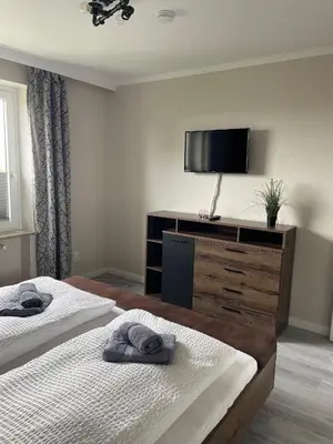 Ein Bett oder Betten in einem Zimmer der Unterkunft Wohnung Strandhafer (Nr. 49) - Haus Rainer