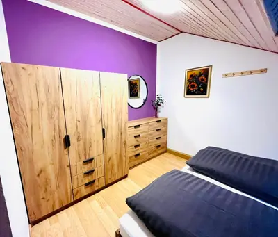 Ein Bett oder Betten in einem Zimmer der Unterkunft Lüttje Deichvilla XL