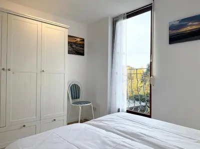 Ein Bett oder Betten in einem Zimmer der Unterkunft Haus Muschelnest