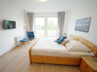 Ein Bett oder Betten in einem Zimmer der Unterkunft Holiday apartment with 1 bedroom