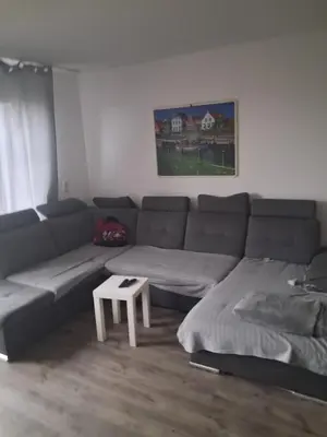 Ein Sitzbereich in der Unterkunft Schöne Doppelhaushälfte am Meer!