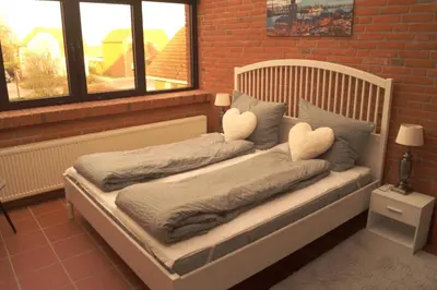 Ein Bett oder Betten in einem Zimmer der Unterkunft Apartment in Friedrichskoog with 130 sqm
