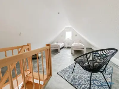 Ein Bett oder Betten in einem Zimmer der Unterkunft Residenz Liegeplatz