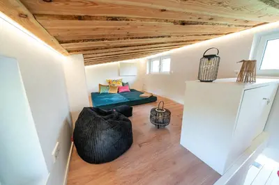 Ein Sitzbereich in der Unterkunft Tinyhouse Moorhütte Nordsee Natur Küste