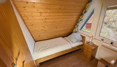 Ein Bett oder Betten in einem Zimmer der Unterkunft Haus Küstenglück
