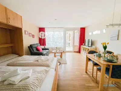 Ein Bett oder Betten in einem Zimmer der Unterkunft Haus Trafalgar Wohnung 130