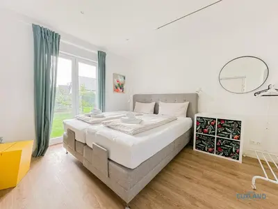 Ein Bett oder Betten in einem Zimmer der Unterkunft Ferienhaus am Ringwall 19