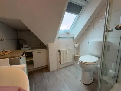 Ein Badezimmer in der Unterkunft Land & Meer Wohnung 22