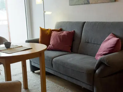 Ein Sitzbereich in der Unterkunft Land & Meer Wohnung 22