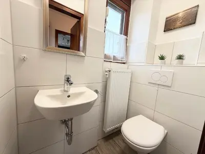 Ein Badezimmer in der Unterkunft Haus Muschelnest