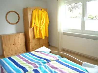 Ein Bett oder Betten in einem Zimmer der Unterkunft Holiday Home mit Indoorpool- Garten und Partyraum by Interhome