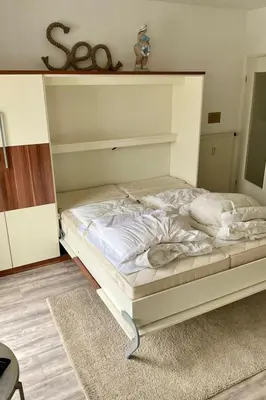 Ein Bett oder Betten in einem Zimmer der Unterkunft Apartment Nordseedüne II by Interhome