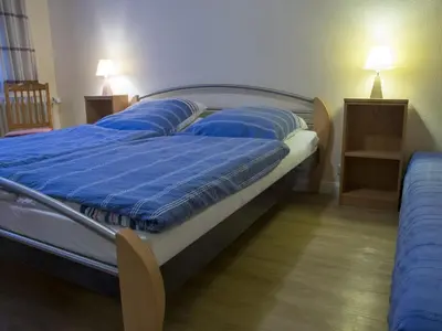 Ein Bett oder Betten in einem Zimmer der Unterkunft 5 - at the Gerdts country house