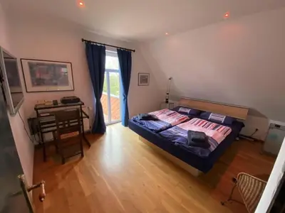 Ein Bett oder Betten in einem Zimmer der Unterkunft Holiday home with 4 bedrooms
