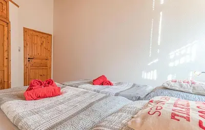 Ein Bett oder Betten in einem Zimmer der Unterkunft Zur alten Dorfschule