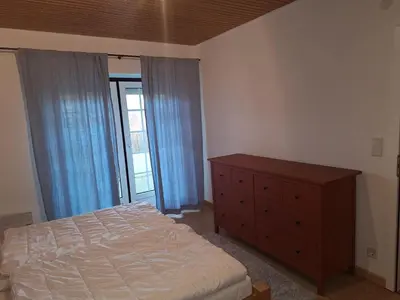 Ein Bett oder Betten in einem Zimmer der Unterkunft Deichkieker