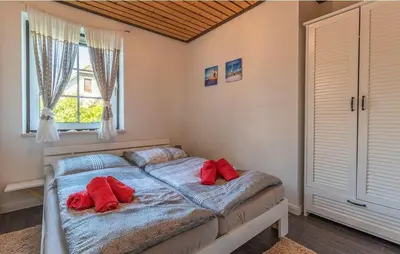 Ein Bett oder Betten in einem Zimmer der Unterkunft Deichschaf