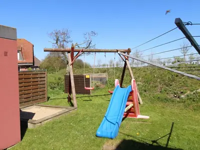Ein Kinderspielbereich in der Unterkunft Apartment FeWo Strandläufer by Interhome