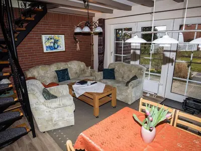 Ein Sitzbereich in der Unterkunft Apartment FeWo Strandläufer by Interhome