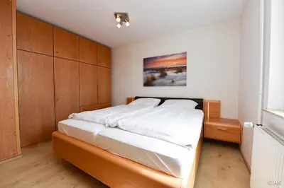 Ein Bett oder Betten in einem Zimmer der Unterkunft Haus Pacific Pacific FeWo 81