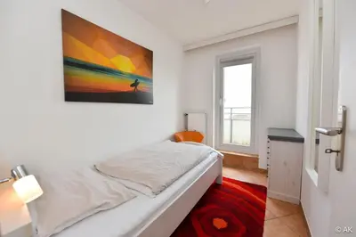 Ein Bett oder Betten in einem Zimmer der Unterkunft Haus Pacific Pacific FeWo 81