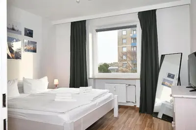 Ein Bett oder Betten in einem Zimmer der Unterkunft Küstenflair