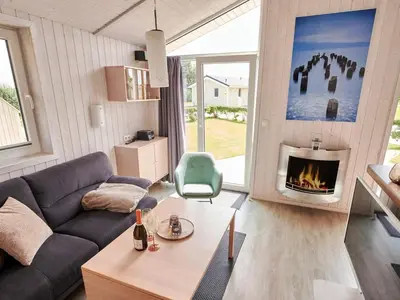 Ein Sitzbereich in der Unterkunft Holiday Home near North Sea Dike