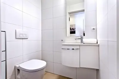 Ein Badezimmer in der Unterkunft Alte Liebe, RA108