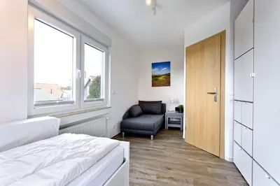 Ein Bett oder Betten in einem Zimmer der Unterkunft Ferienhaus 