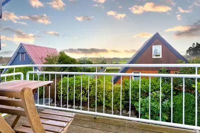 Ein Balkon oder eine Terrasse in der Unterkunft Ferienhaus 