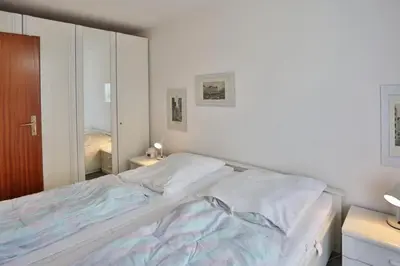 Ein Bett oder Betten in einem Zimmer der Unterkunft Hohe Worth, H3