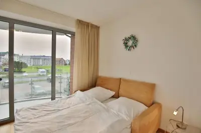 Ein Bett oder Betten in einem Zimmer der Unterkunft Residenz am Yachthafen, RY12