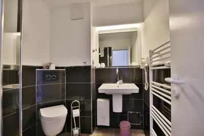 Ein Badezimmer in der Unterkunft Hohe Worth, H406