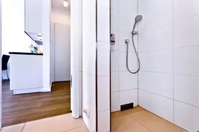 Ein Badezimmer in der Unterkunft Alte Liebe, RA209