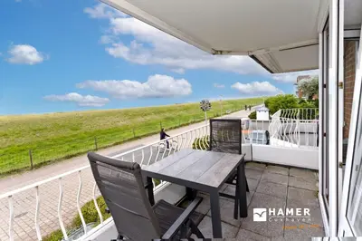Ein Balkon oder eine Terrasse in der Unterkunft Nordseeperle, NP7