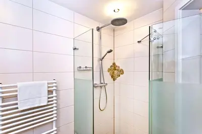Ein Badezimmer in der Unterkunft Residenz am Yachthafen, RY29