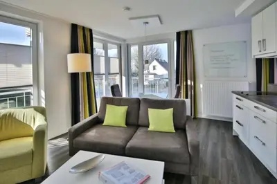 Ein Sitzbereich in der Unterkunft Duhner Strandhus, S102