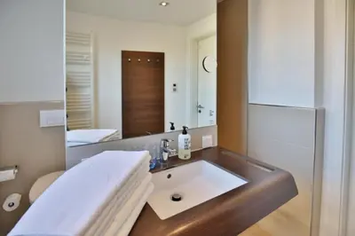 Ein Badezimmer in der Unterkunft Duhner Strandhus, S102