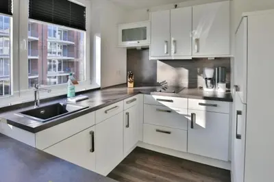 Küche/Küchenzeile in der Unterkunft Duhner Strandhus, S114