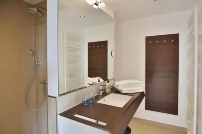 Ein Badezimmer in der Unterkunft Duhner Strandhus, S114