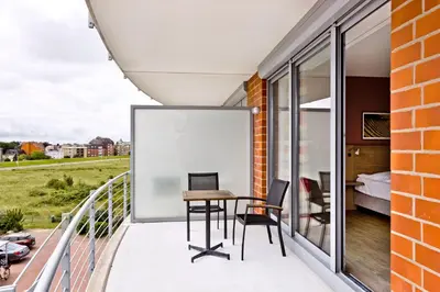 Ein Balkon oder eine Terrasse in der Unterkunft Residenz am Yachthafen, RY16