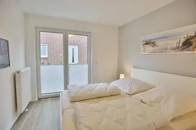 Ein Bett oder Betten in einem Zimmer der Unterkunft Meine See, MS4