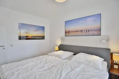Ein Bett oder Betten in einem Zimmer der Unterkunft Hohe Lith, HL117