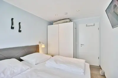 Ein Bett oder Betten in einem Zimmer der Unterkunft Admiralsgarten, AG5b